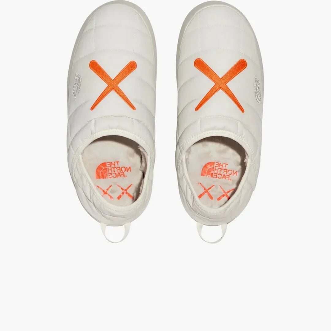 The North Face Thermoball Traction Mule Vs Kaws Moonlight Ivory Orange - Image 2